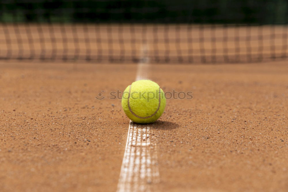 Similar – Image, Stock Photo Yellow tennis ball on red clay ground court