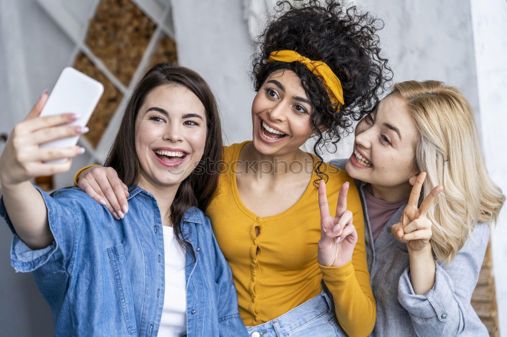 Similar – Image, Stock Photo Women taking selfie in studio