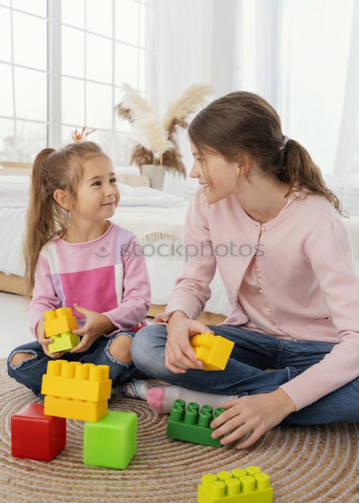 Similar – two beautiful sisters playing at home