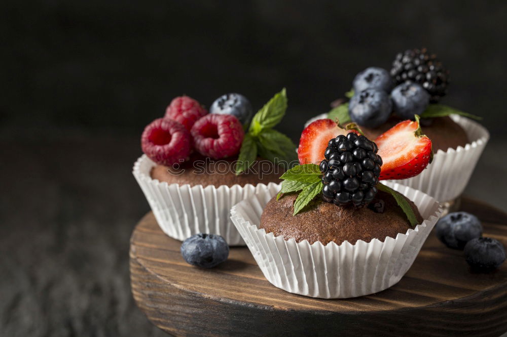 Similar – Image, Stock Photo Delicious tartlets with raspberries and blueberries