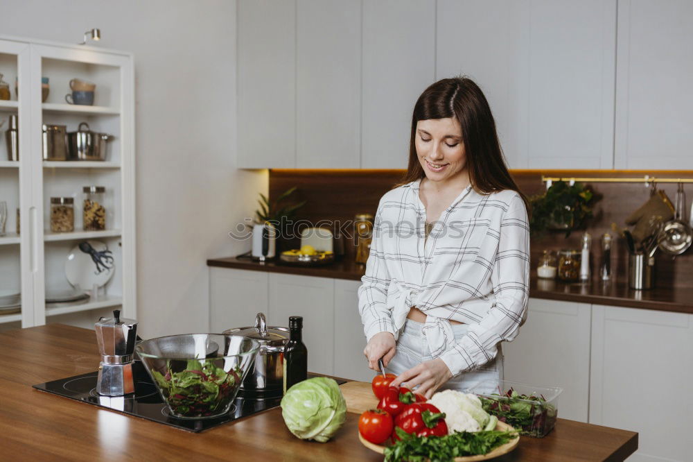 Similar – Woman preparing sandwiches in kitchen