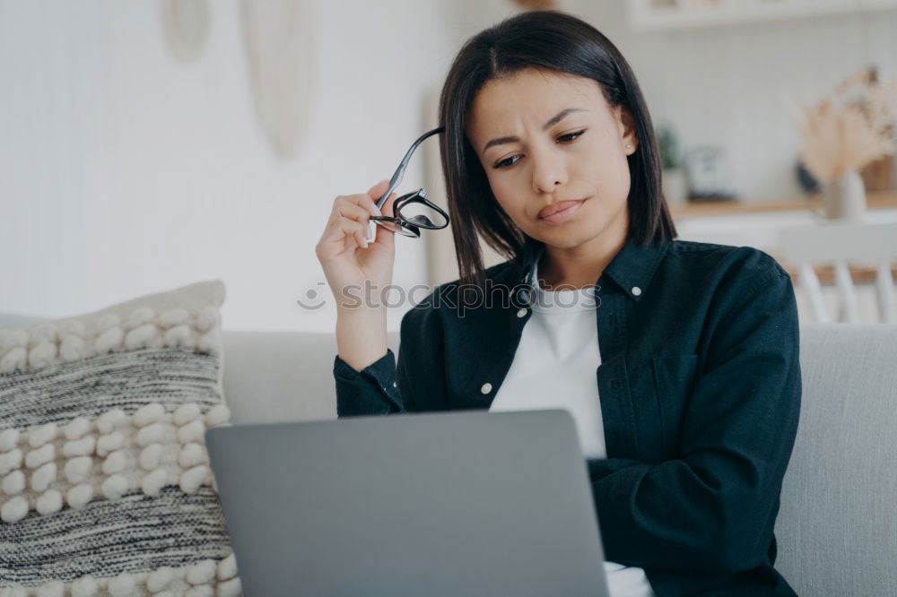 Similar – Image, Stock Photo afrcian woman on her cellphone while looking at laptop