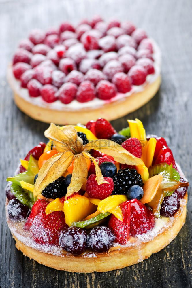 Similar – Image, Stock Photo Delicious tartlets with raspberries and blueberries