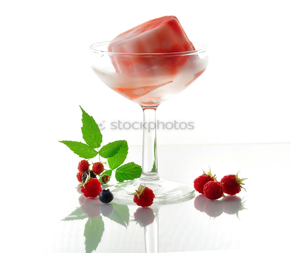 Similar – A glass of cool delicious soft drink with strawberry and currant on white background