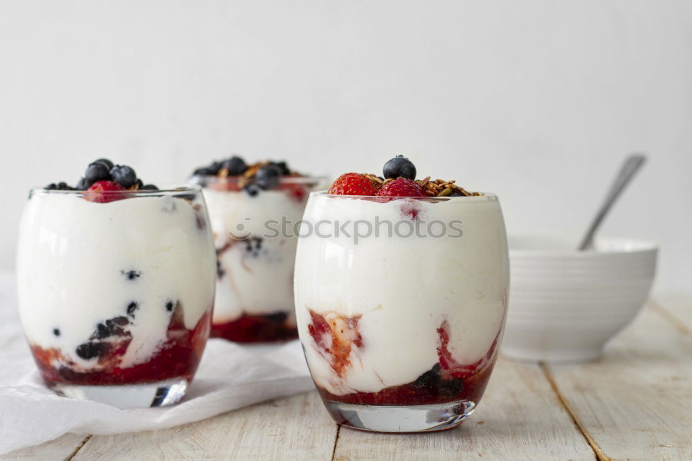 Similar – Image, Stock Photo Chia pudding Strawberry parfait with greek yogurt and nuts