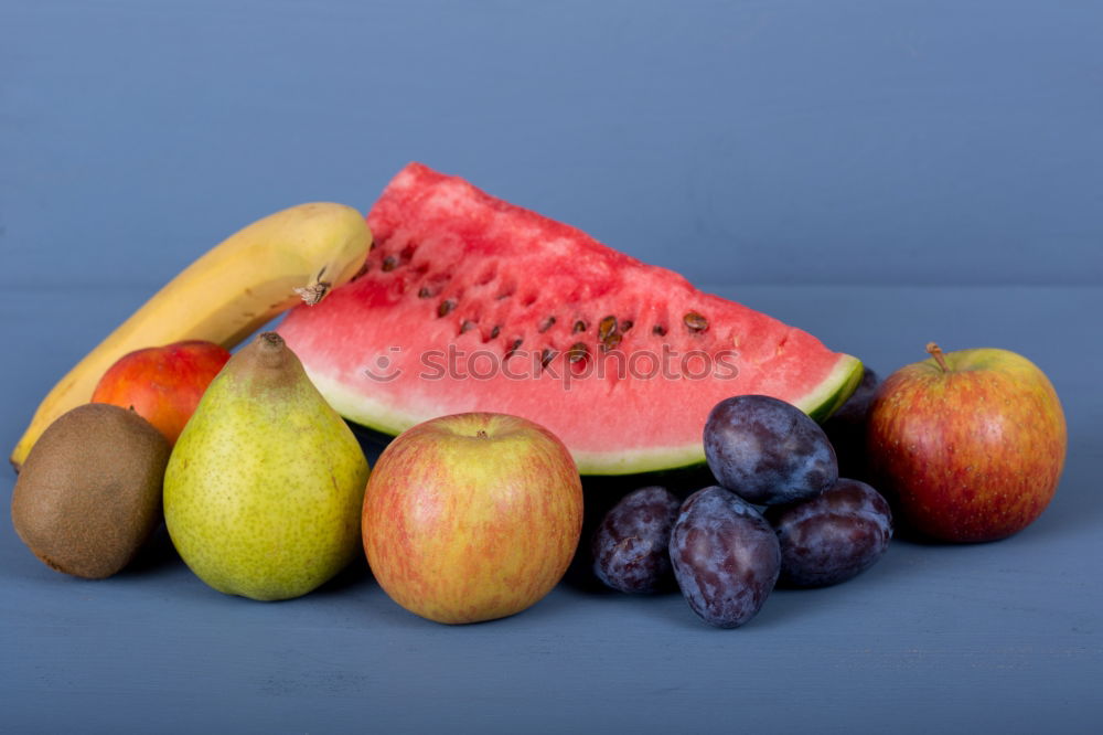 Image, Stock Photo colorful tropical fruits on blue wooden background