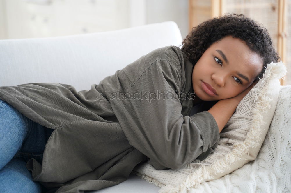 Similar – Image, Stock Photo Portrait of a young thoughtful mixed race man sitting in the sofa