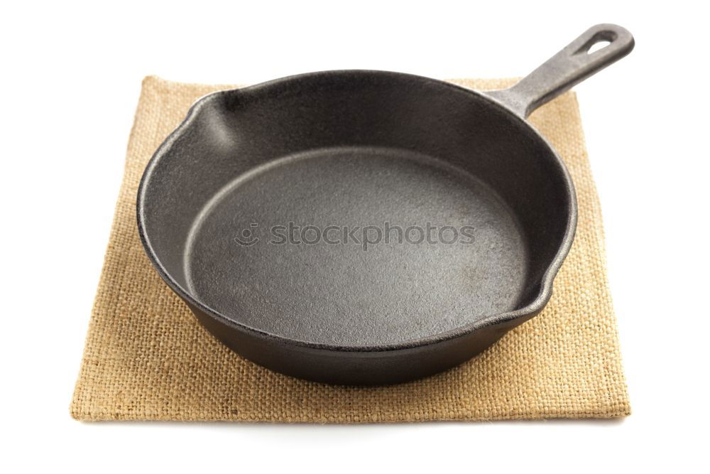 Similar – black round cast iron pan