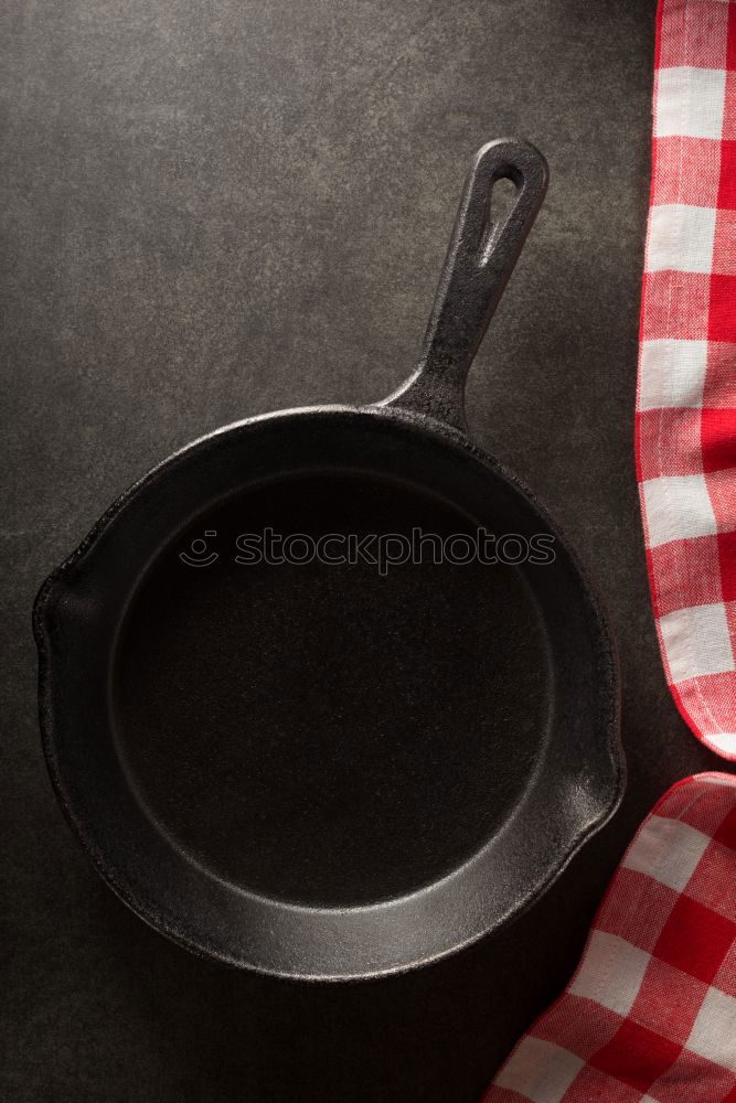 Similar – Empty black cast-iron frying pan