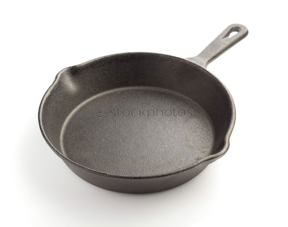 Similar – black round cast iron pan