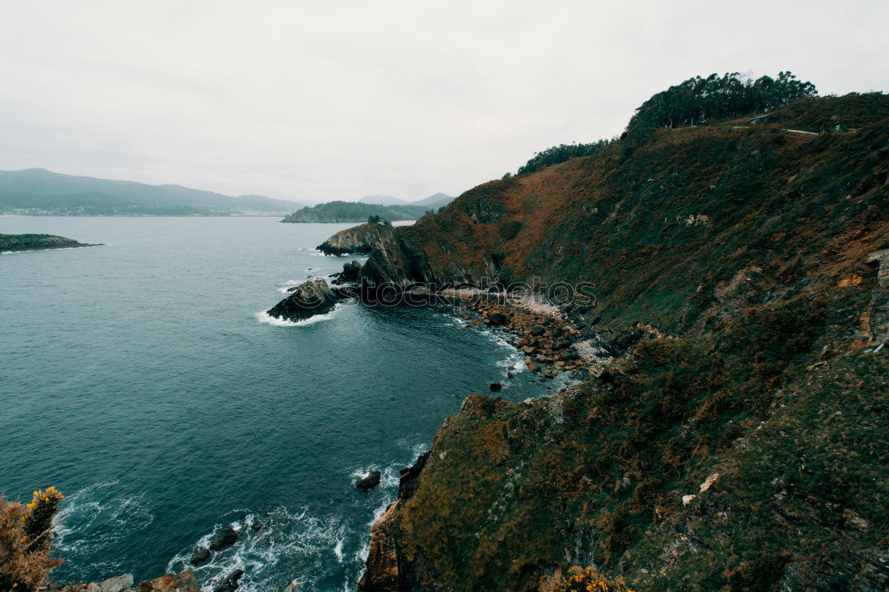 Similar – Cliff in ocean with walkway