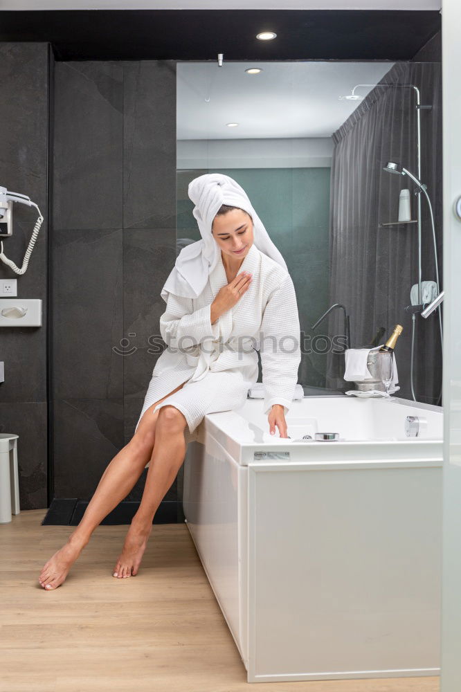 Woman sitting on kitchen table