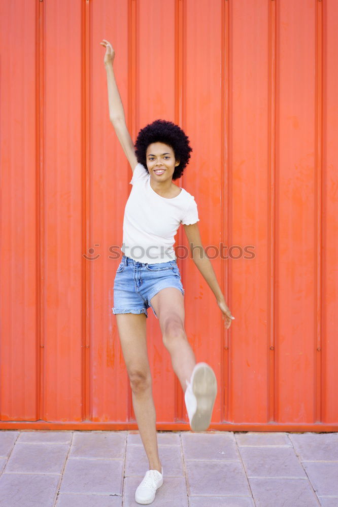 Similar – beautiful mixed girl listening to the music happy in the street