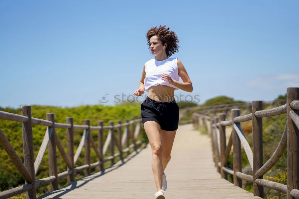 Similar – Image, Stock Photo Black woman, afro hairstyle, running outdoors in urban road.