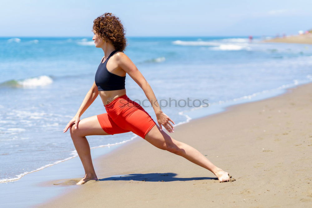 Similar – Black woman, afro hairstyle, doing yoga in the beach.