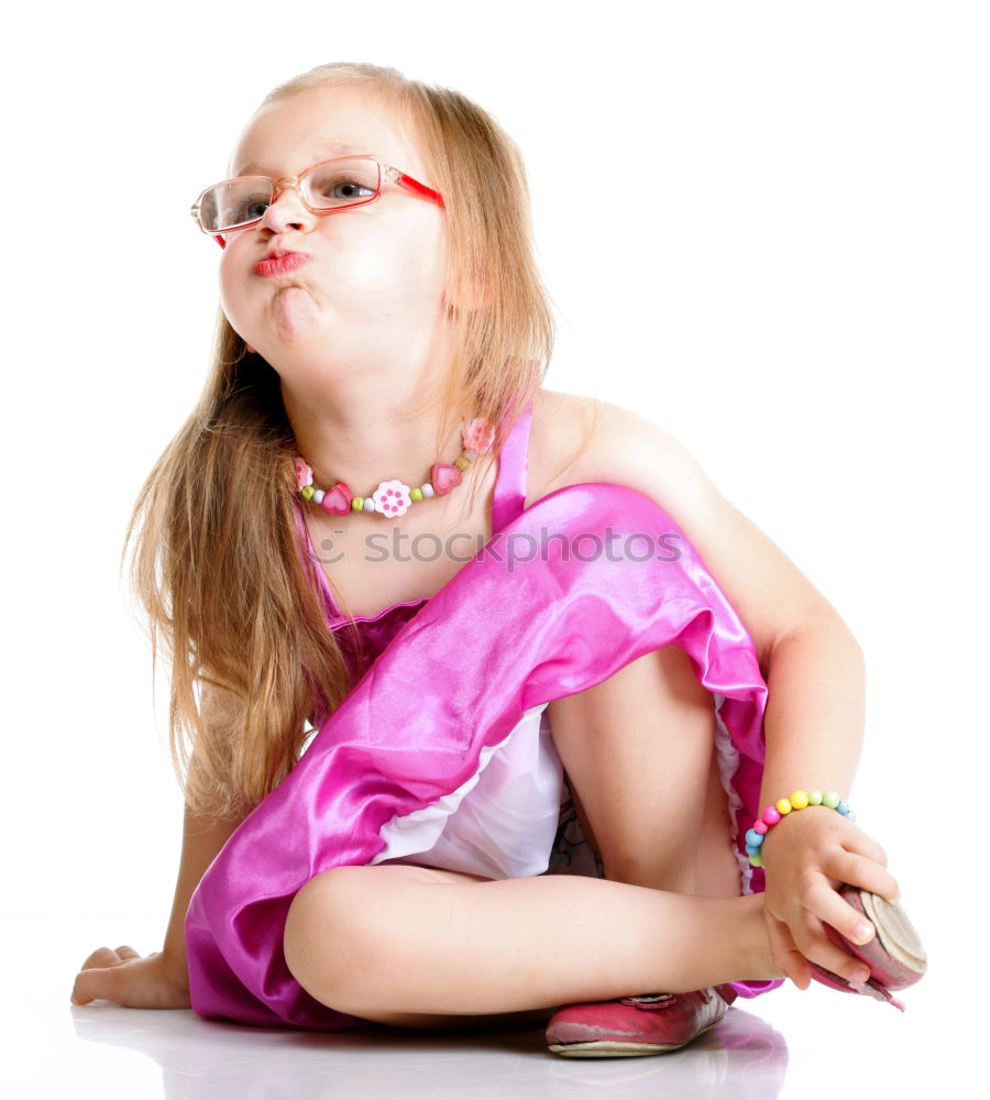 Similar – Little girl enjoying her role of princess. Adorable cute 5-6 years old girl wearing pink princess dress and tiara