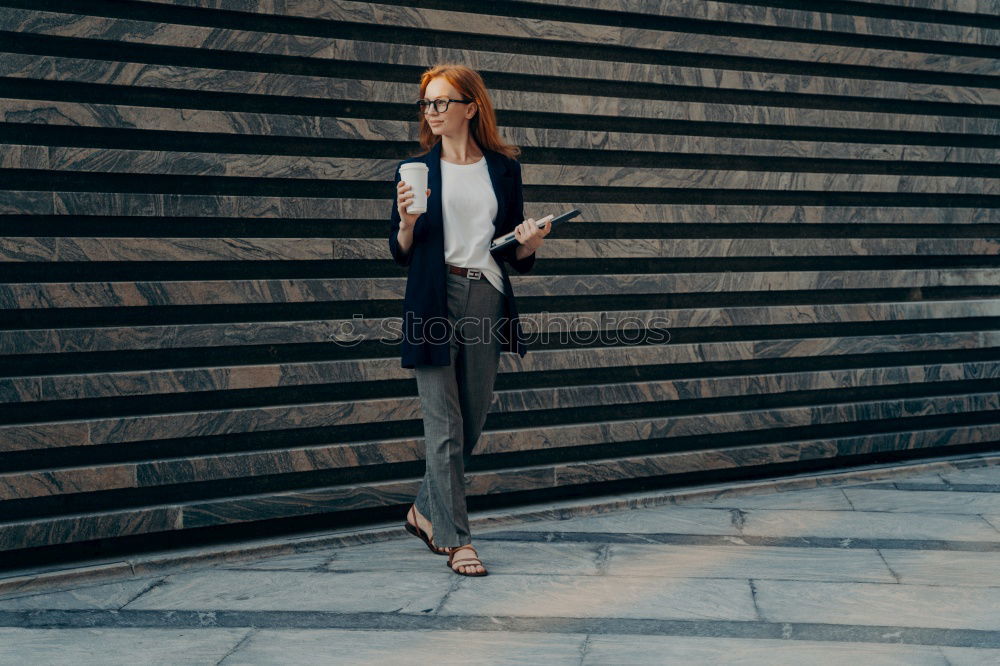 Similar – Image, Stock Photo Pretty yong girl standing behind shop center