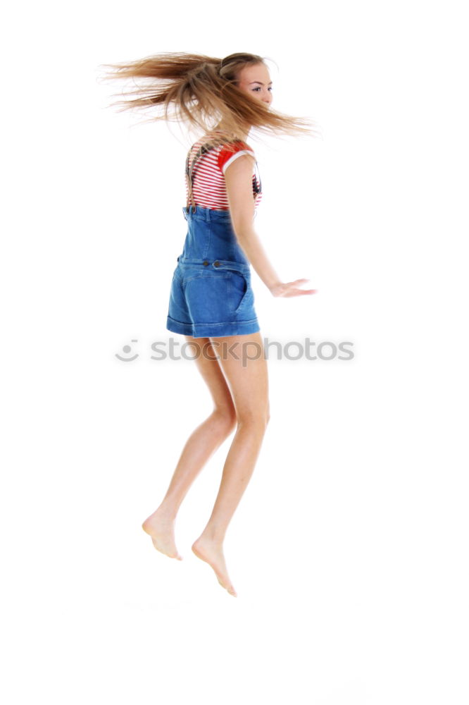 Similar – Image, Stock Photo Young, athletic, slender woman stands sideways in front of a white wall with her head bent forward so that her long brunette hair hangs down in front of her face