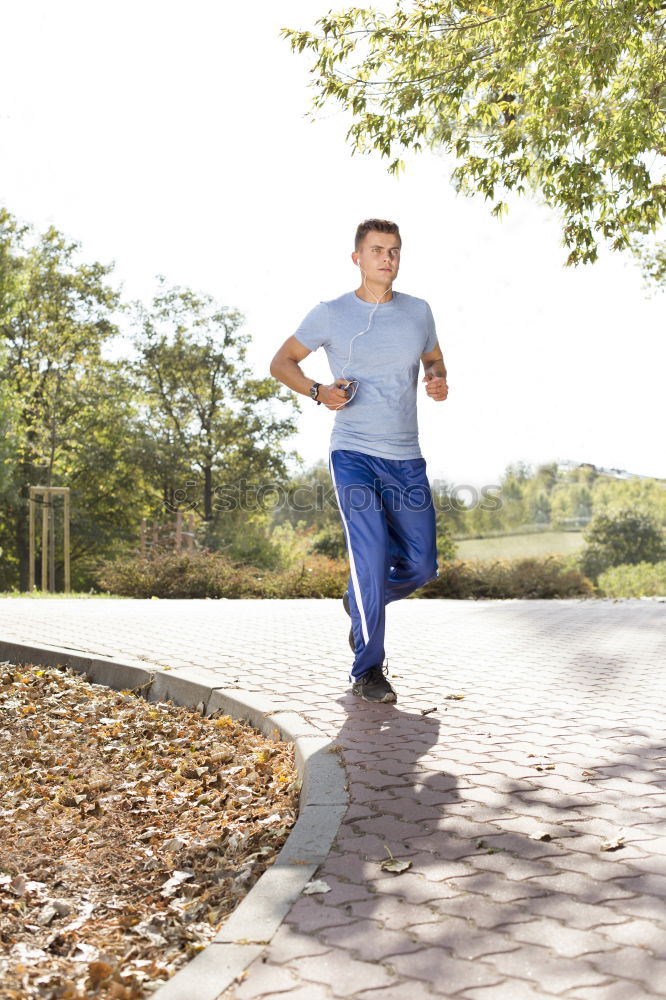 Similar – Senior runner man sitting after jogging in a park