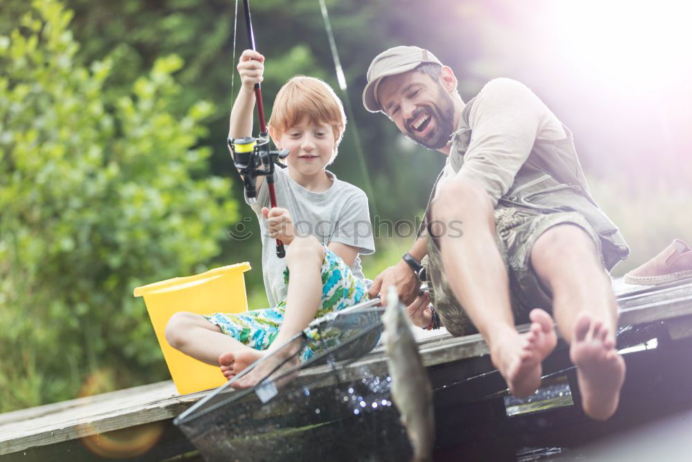 Similar – Boys loading canoe into truck.