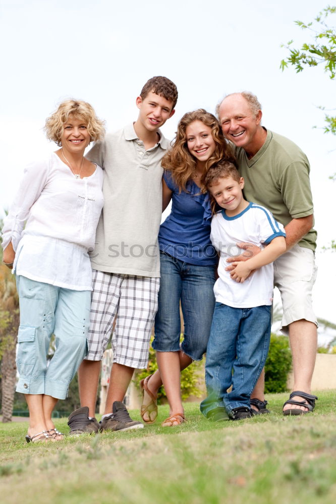 Similar – Image, Stock Photo Father and children walking on the road at the day time.