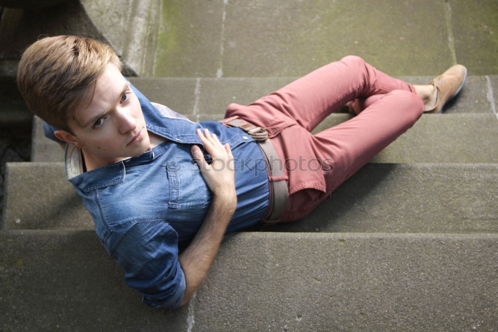 Similar – young man wearing suspenders in urban background