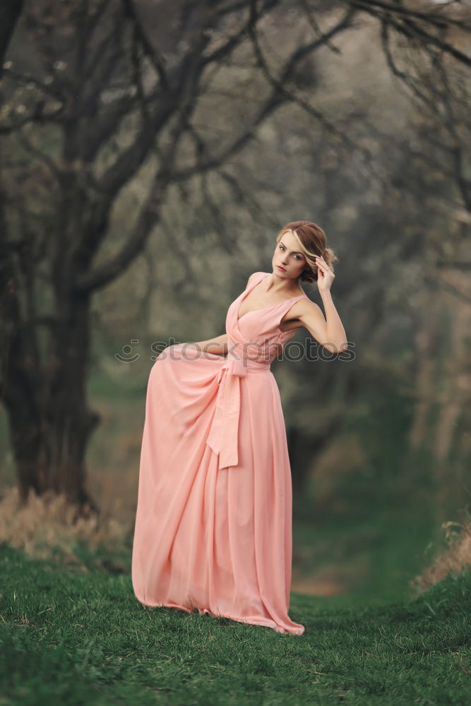 Similar – Happy senior woman sitting on the grass