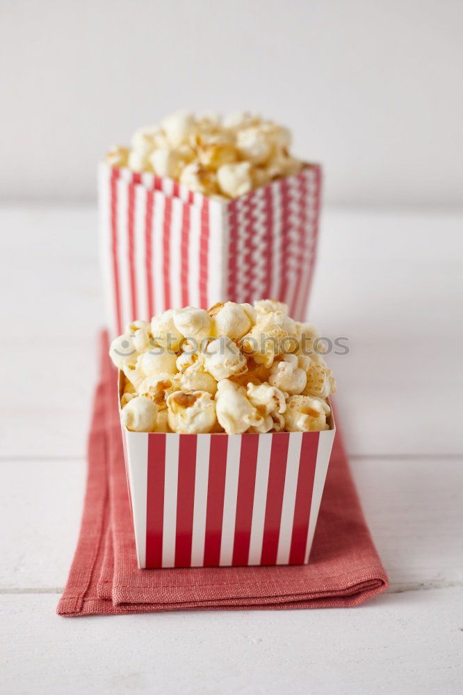 Similar – Two popcorn boxes and a red heart