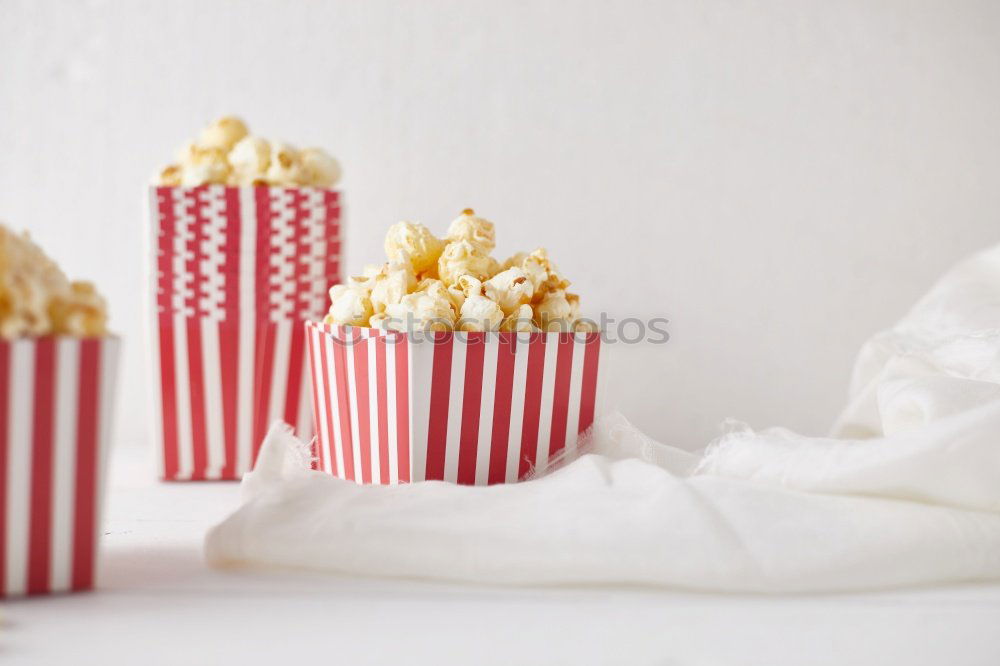 Similar – Two popcorn boxes and a red heart