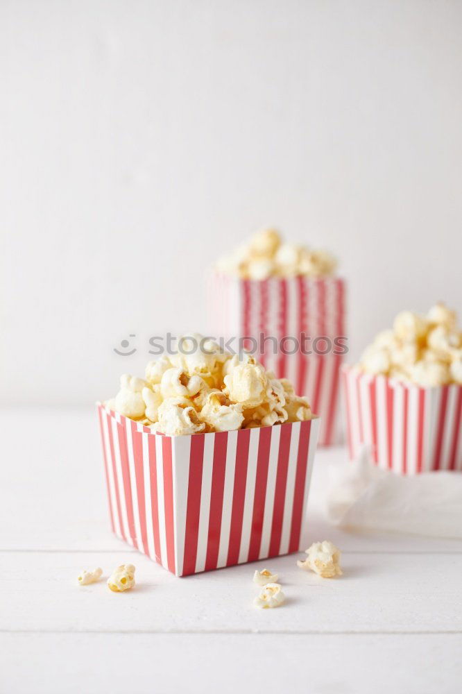 Similar – Two popcorn boxes and a red heart