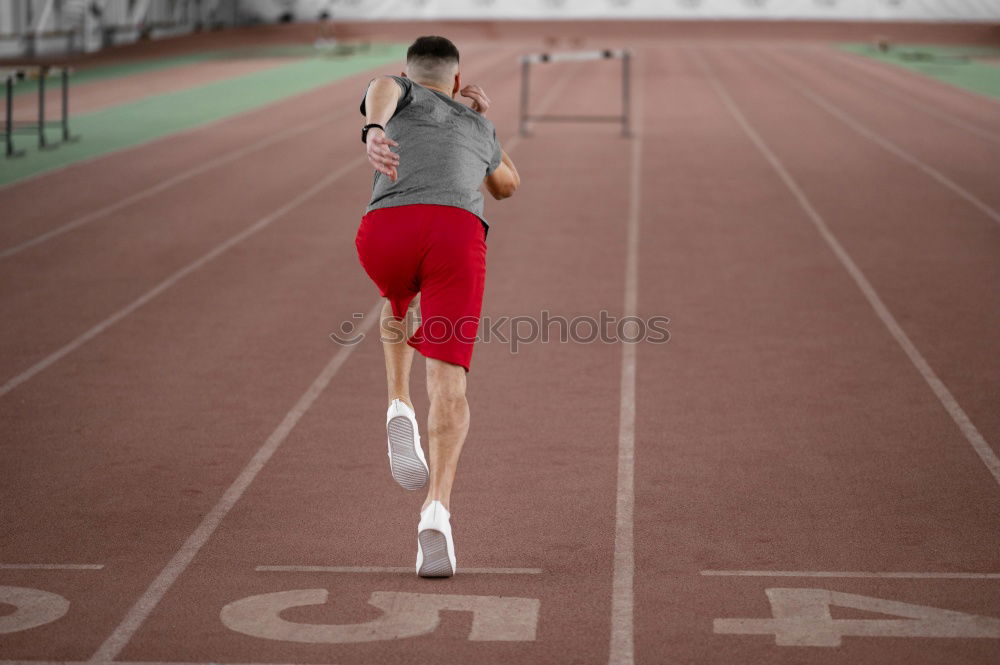 Similar – Side view of male sprinter