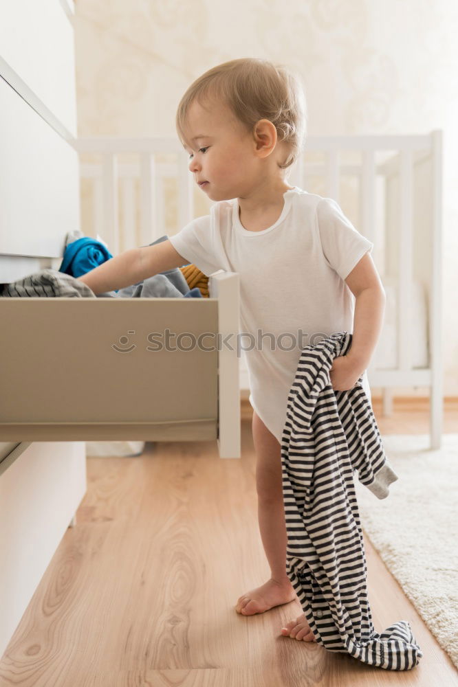 Similar – Image, Stock Photo happy toddler girl in pyjamas