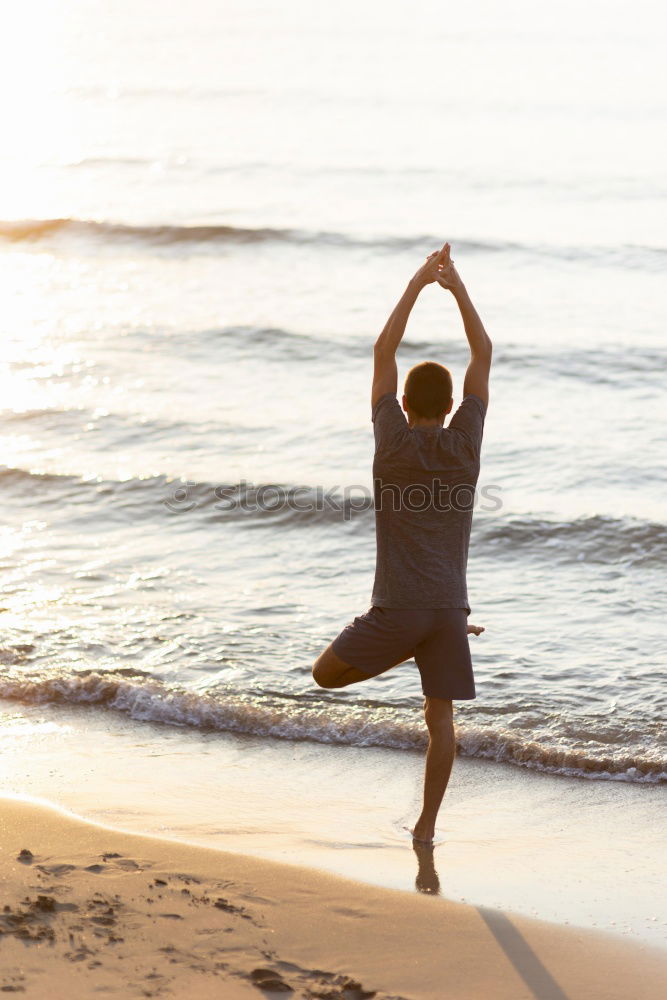 Similar – Image, Stock Photo Woman on the beach doing yoga