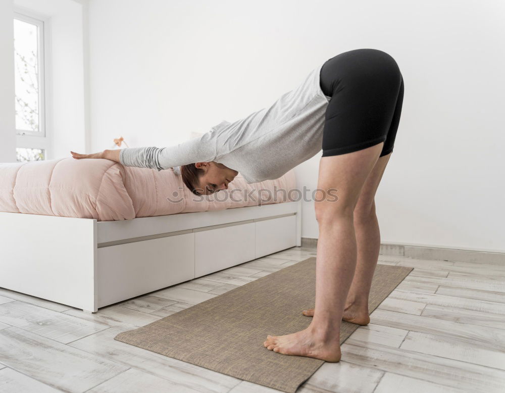 Similar – Image, Stock Photo Woman lying on wooden table with crossed naked strong legs