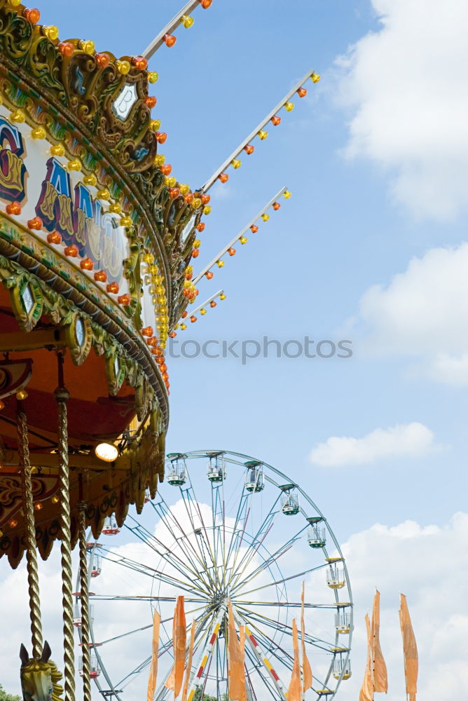 Similar – Twirly swing ride Blue sky