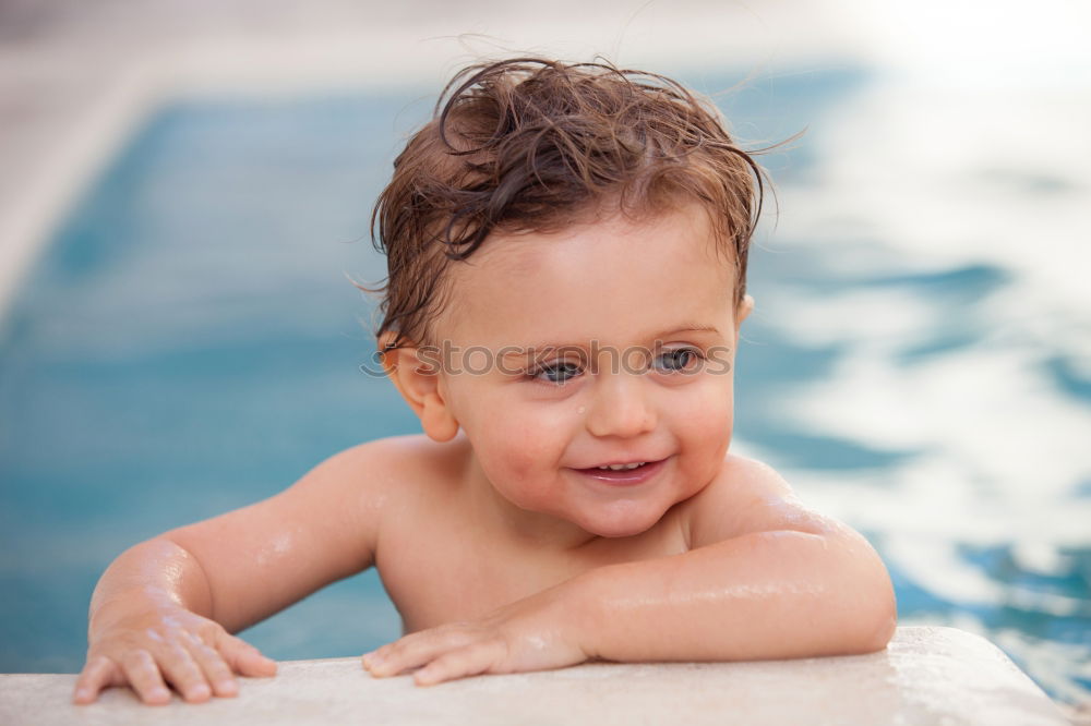 Similar – Kid in snorkel mask posing on poolside