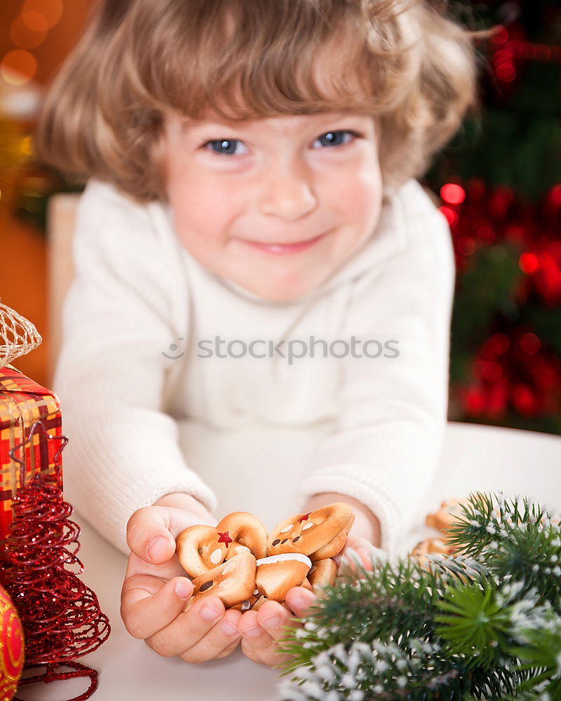 Similar – Image, Stock Photo Little kid decorating Christmas biscuits at Christmas day