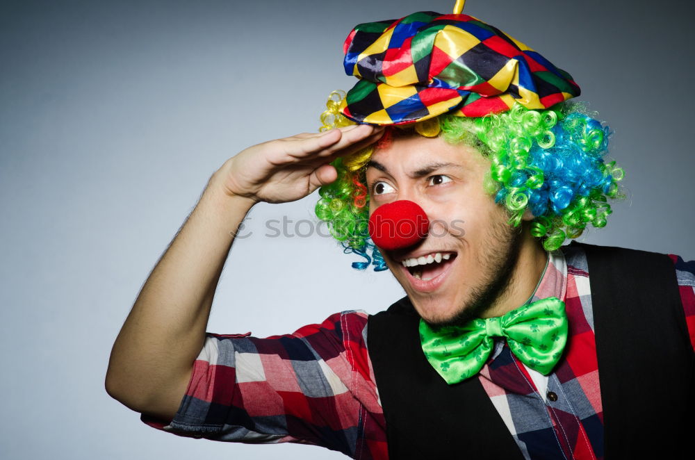 Similar – Close up portrait of a woman with red clown nose