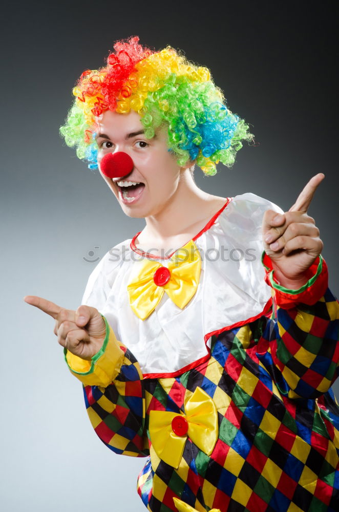 Similar – Close up portrait of a woman with red clown nose