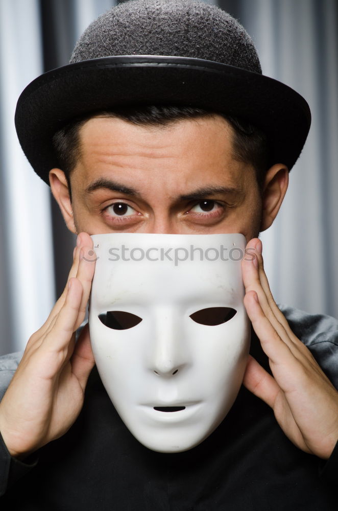 Similar – young man with mask