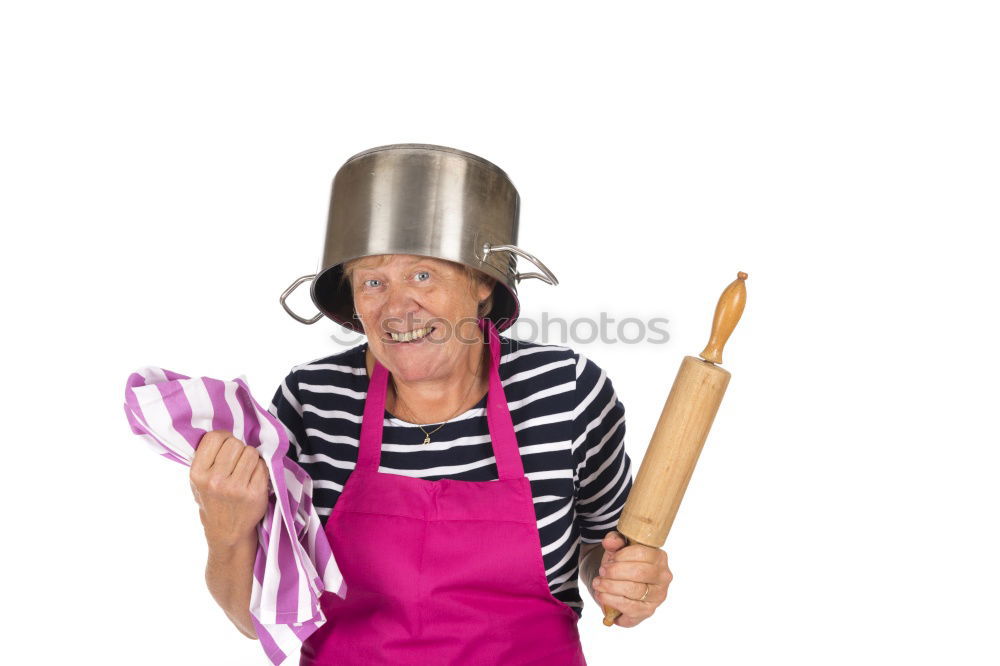 Similar – senior woman with cook hat and rolling pin and spatula on gray background