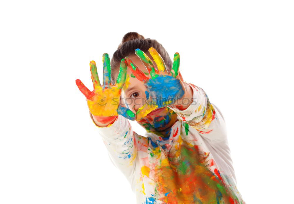 Similar – Kiss of a young woman with colorful paint in her face