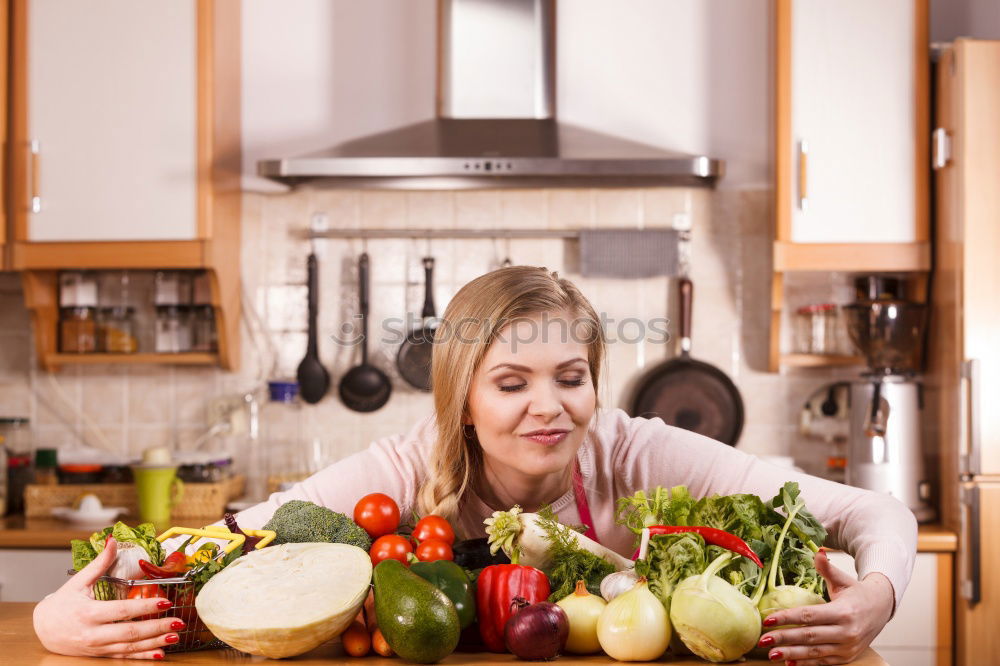 Similar – Young couple cooking. Man and woman in their kitchen