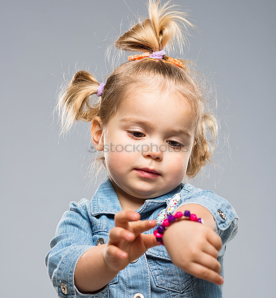 Similar – Child nibbles raspberries from his fingers