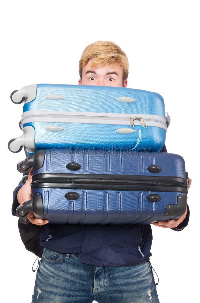 Funny boy smiling inside a suitcase