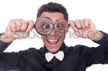 Similar – Image, Stock Photo surprised child looking through magnifying glass on brick background