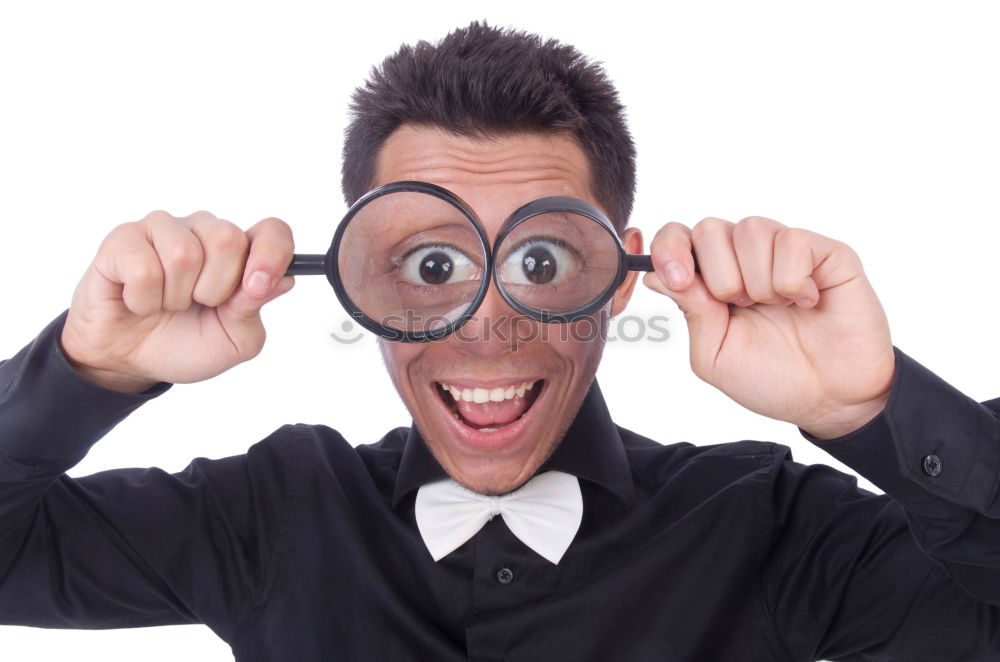 Similar – Image, Stock Photo surprised child looking through magnifying glass on brick background