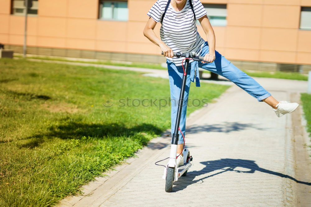 Similar – Image, Stock Photo A man pumps up the tire on his bicycle with a bicycle pump