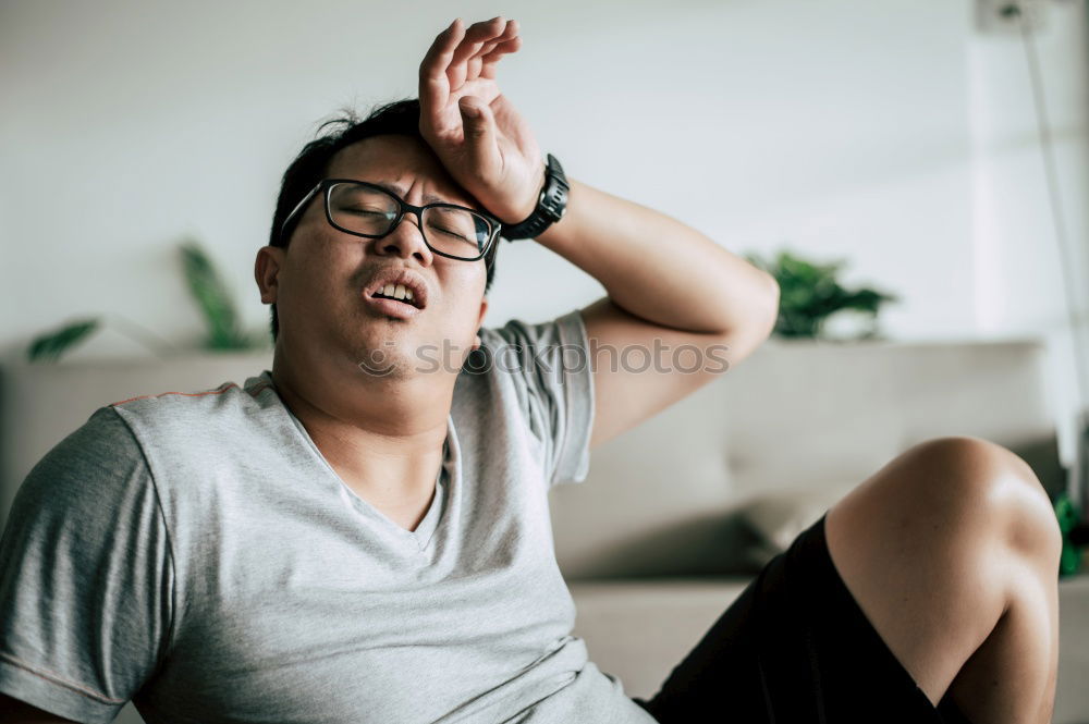 Similar – Image, Stock Photo Portrait of a young thoughtful mixed race man sitting in the sofa