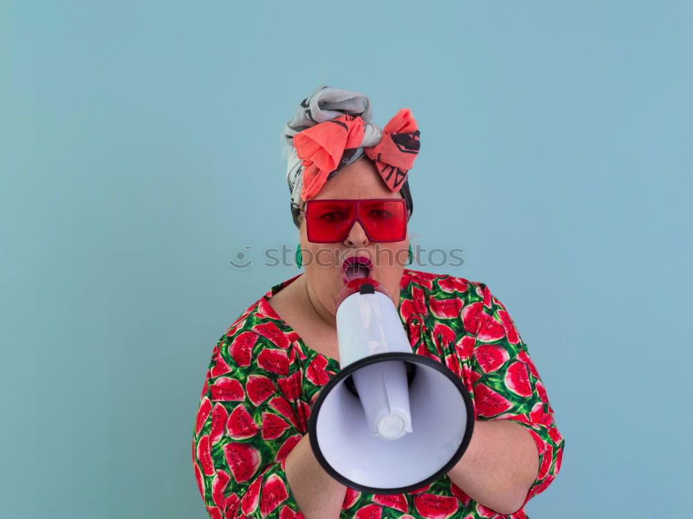 Stylish elderly woman in trendy sunglasses